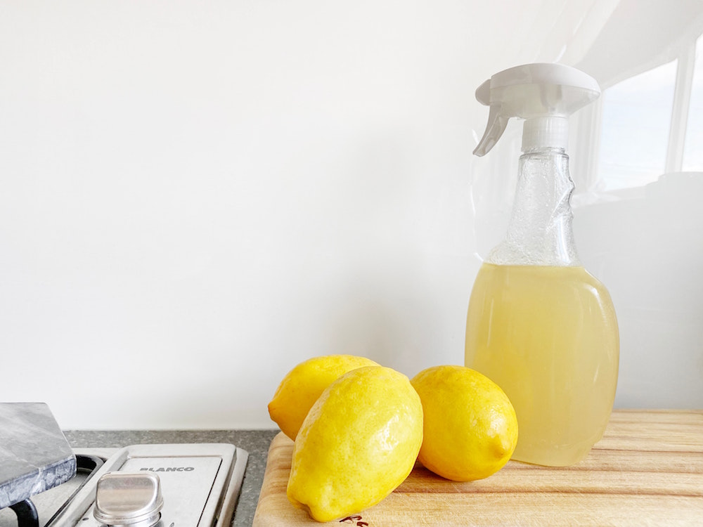 spray bottle with lemon and vinegar