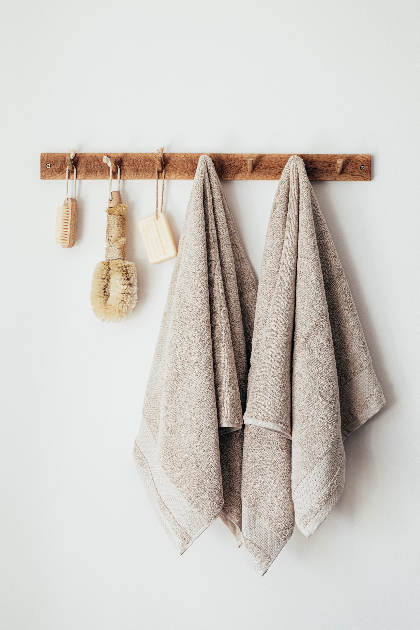 Towels hanging on wall hooks