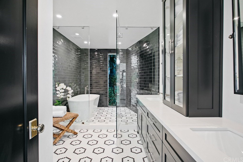 The interior of Leonardo DiCaprio's Spanish-inspired master bathroom, complete with walk-in shower and large soaking tub