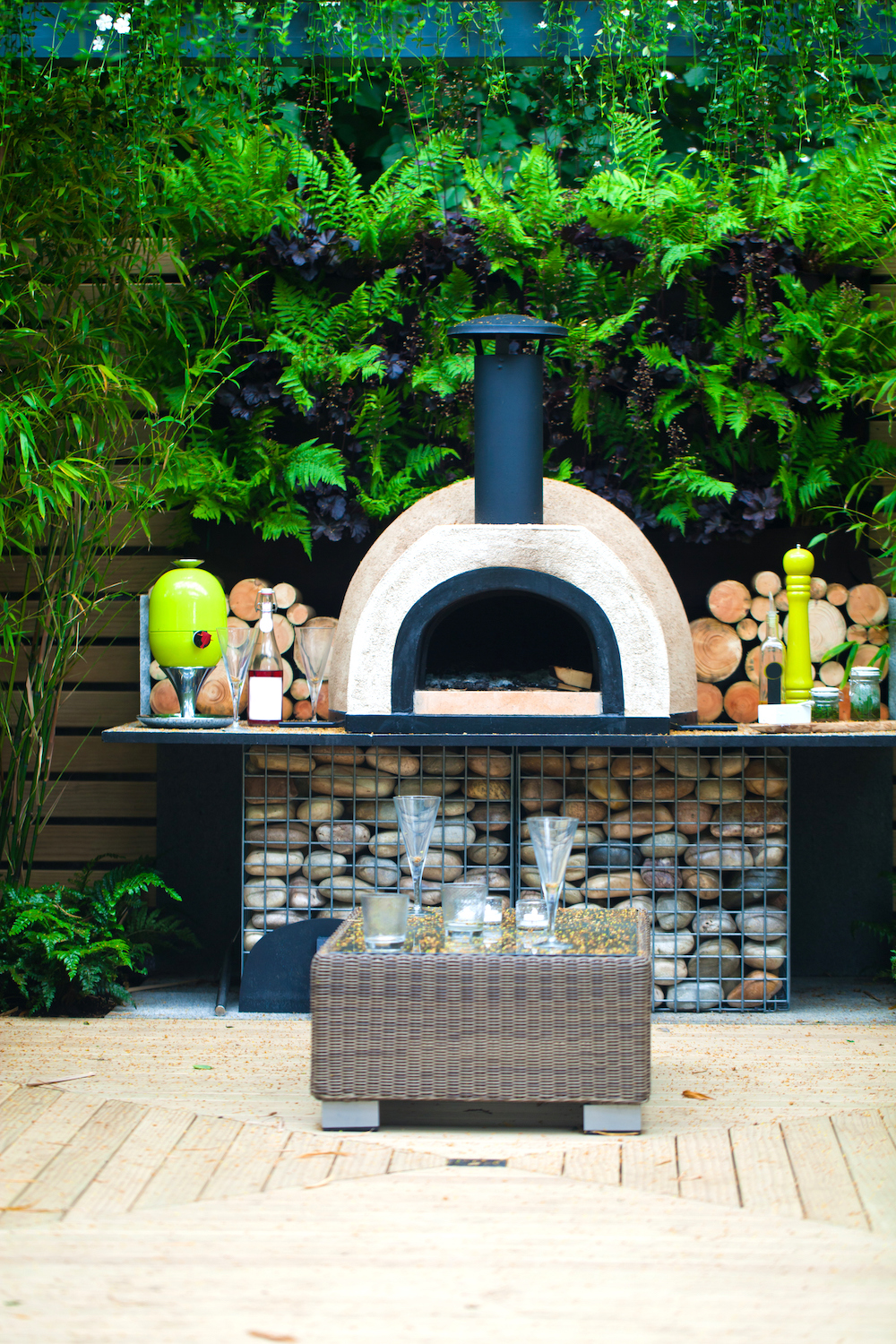 A pizza oven in a garden setting