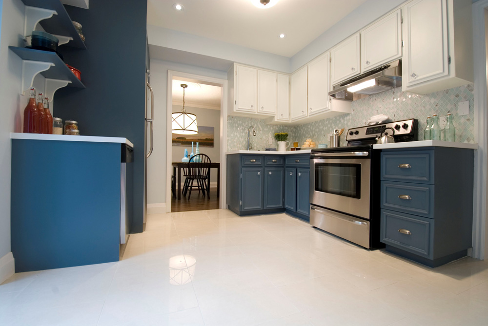 A clean kitchen with vibrant blue cabinetry