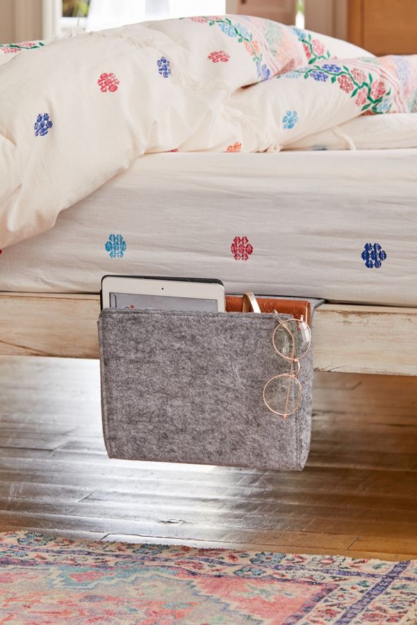 colorful bed with grey organization pocket at side