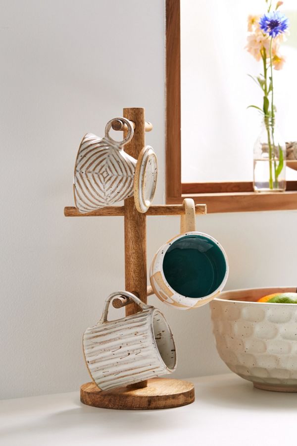 wooden stand with hanging mugs