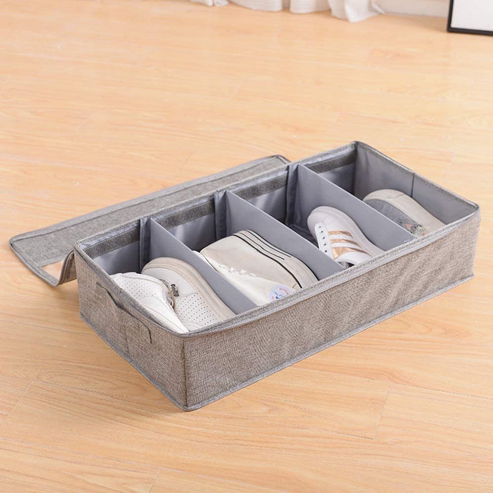 grey box with white sneakers on wood floor