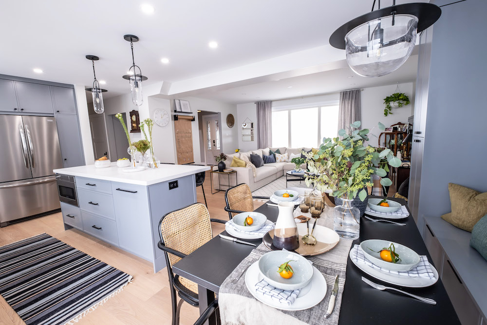 A small kitchen and dining space with banquet seating at the kitchen island
