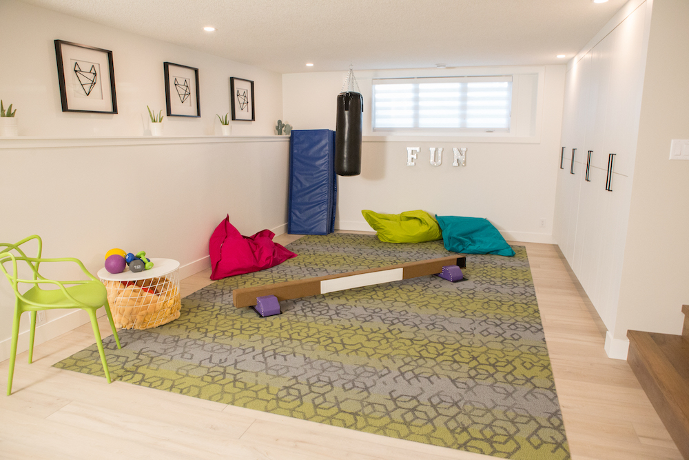 Kids space in the basement with gymnastics gear