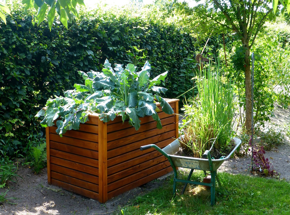 wooden garden box and wheelbarrow garden box