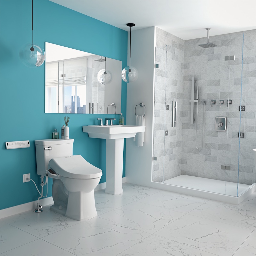 white toilet with bidet seat in blue-and-grey bathroom