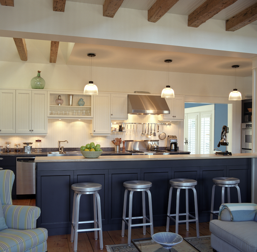 modern white-and-blue kitchen with wooden ceiling beams