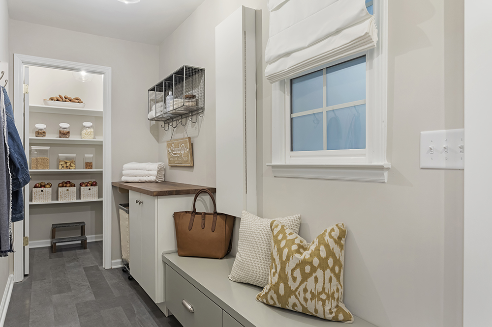 grey mudroom with organized pantry