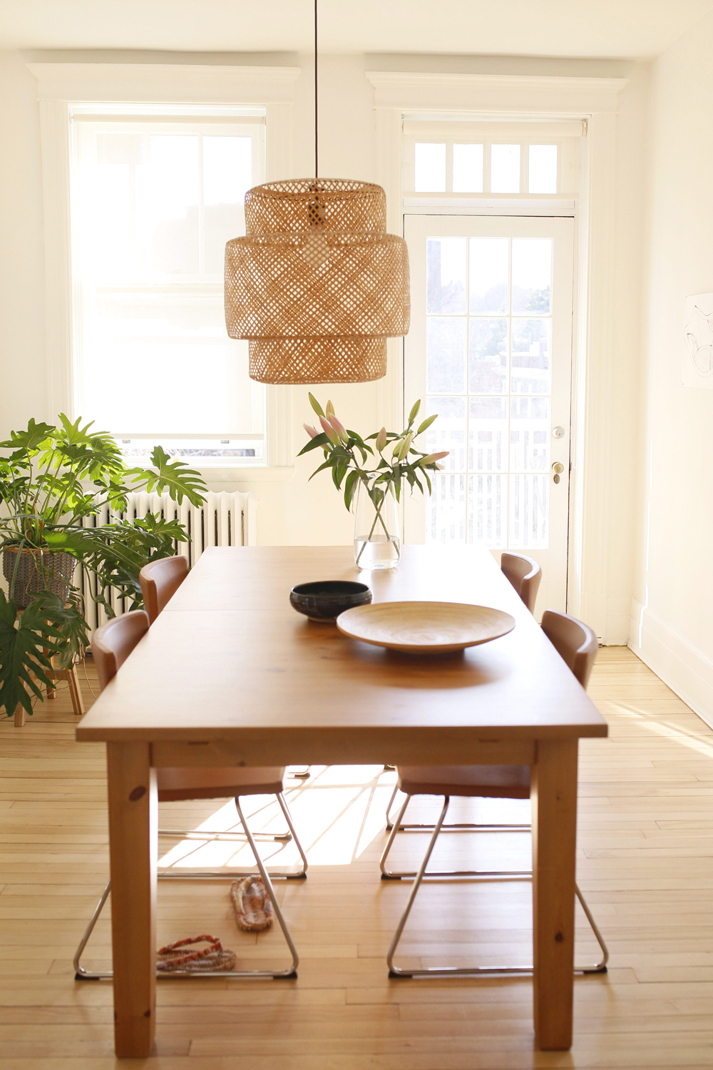 wood kitchen table, four chairs, wicket pendant light