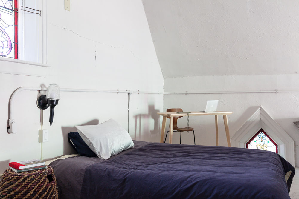 A renovated church bedroom in the attic space