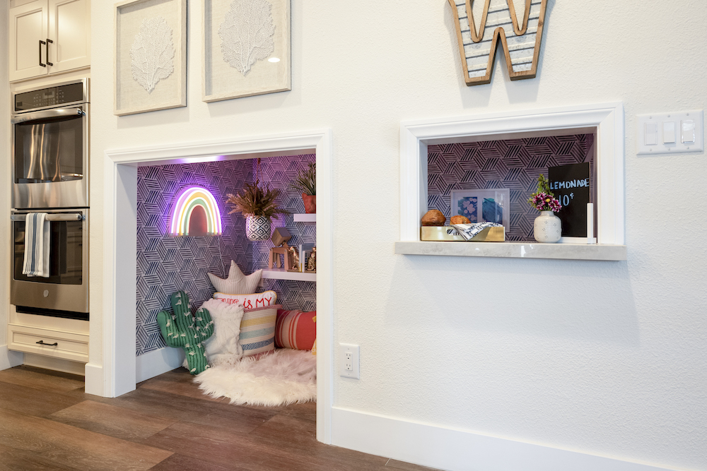 A kids' playroom next to the kitchen and beneath the stairs, as appeared on an episode of The Property Brothers