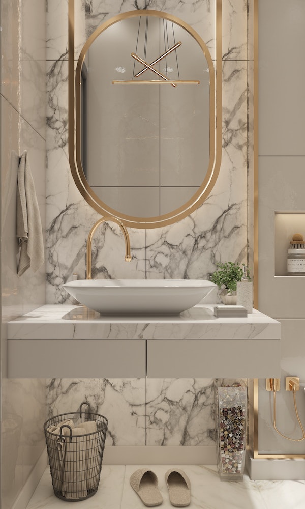 elegant marble bathroom with floating vanity and basket with towels underneath