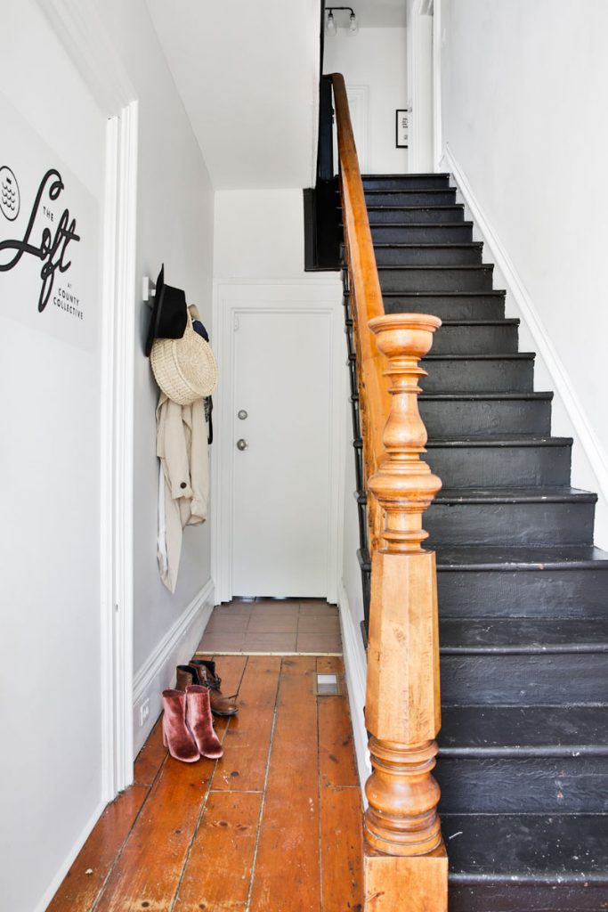 Black staircase, old hardwood floors