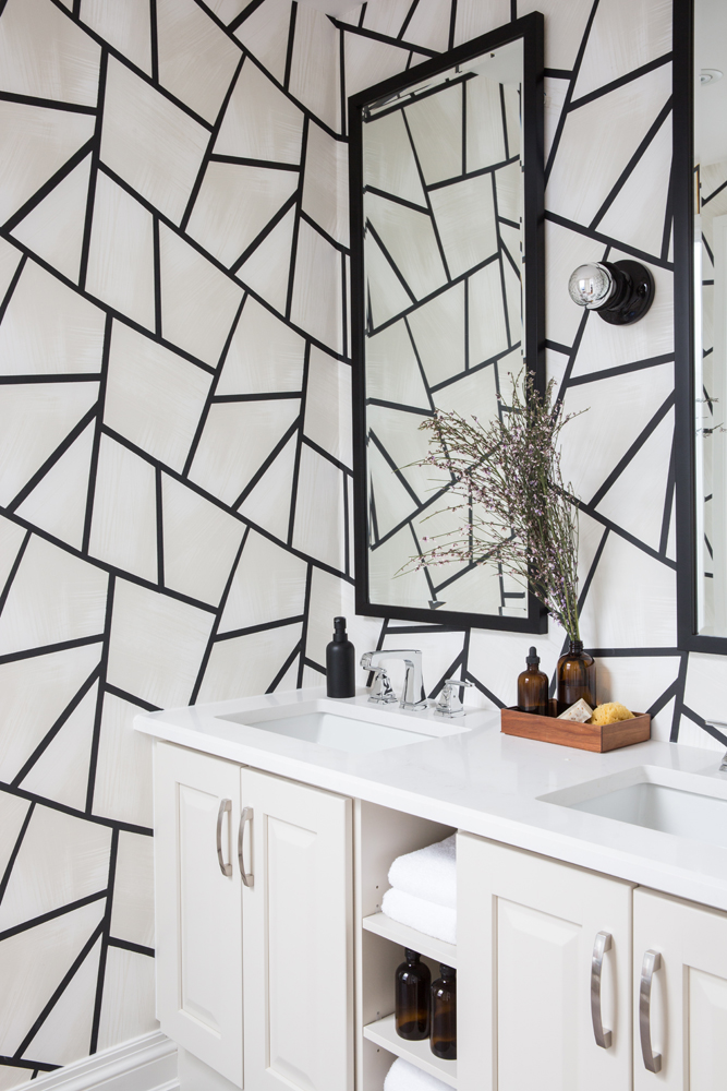Bathroom with black and white graphic wallpaper