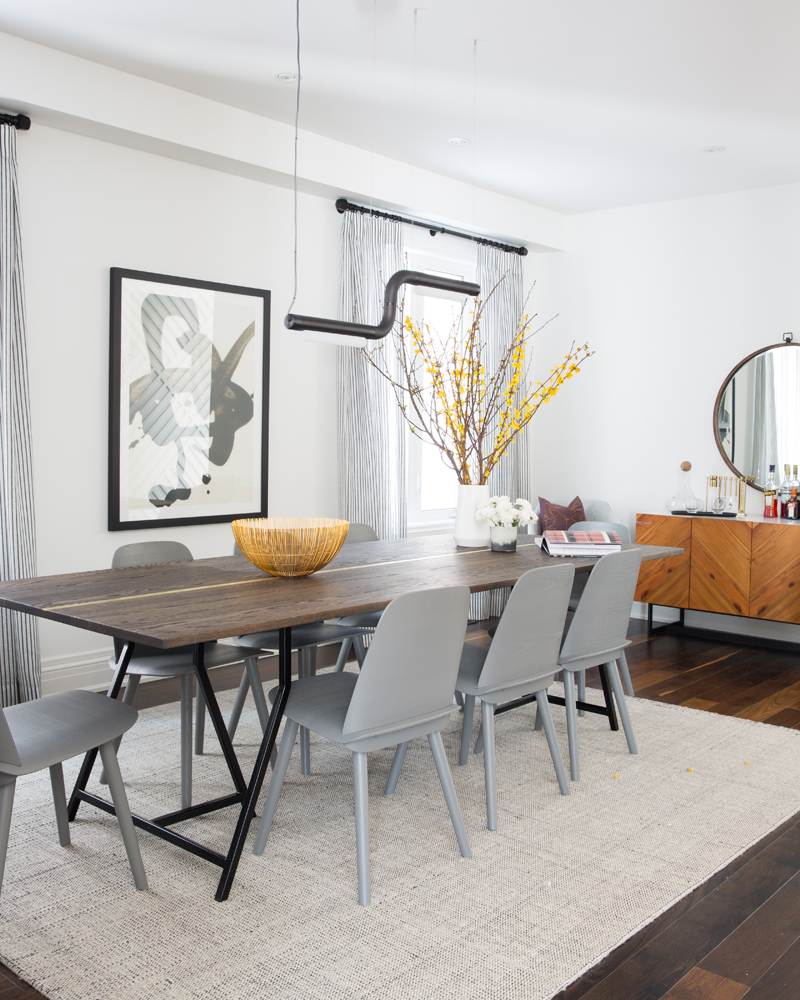 Dining room with wood table, grey chairs