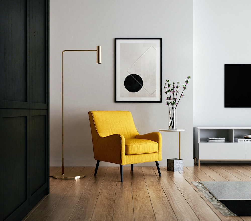 black-and-white living room with yellow chair