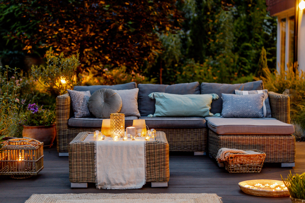 wicker furniture and a variety of lights on a modern designed terrace