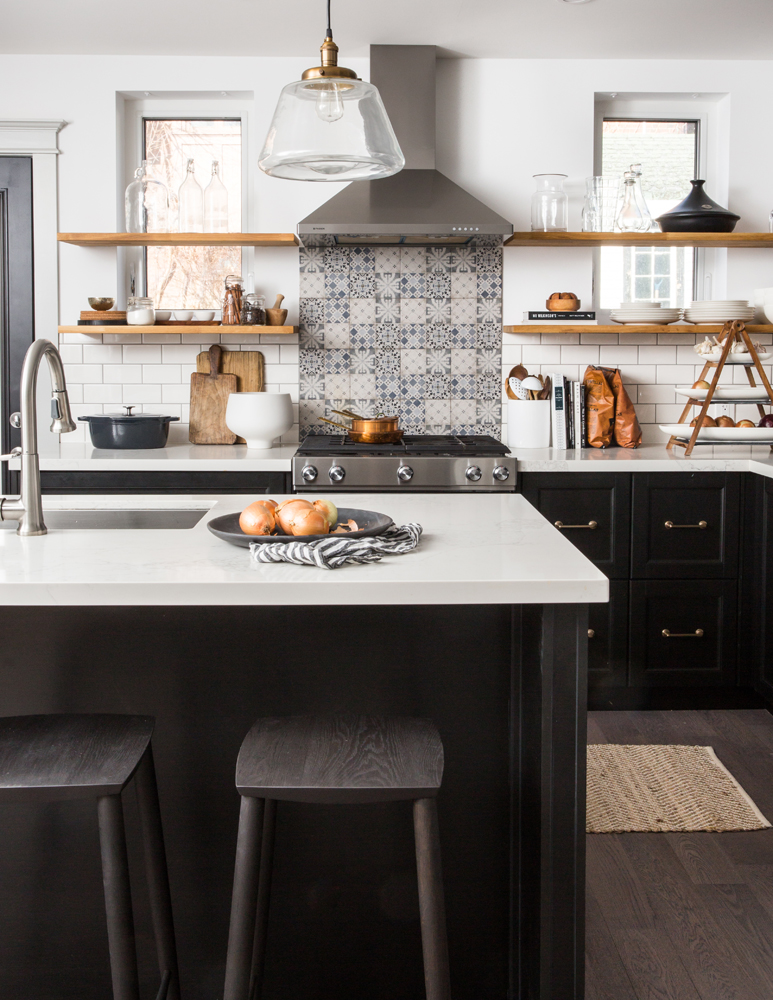 Modern meets rustic kitchen with bold patterned tile backsplash