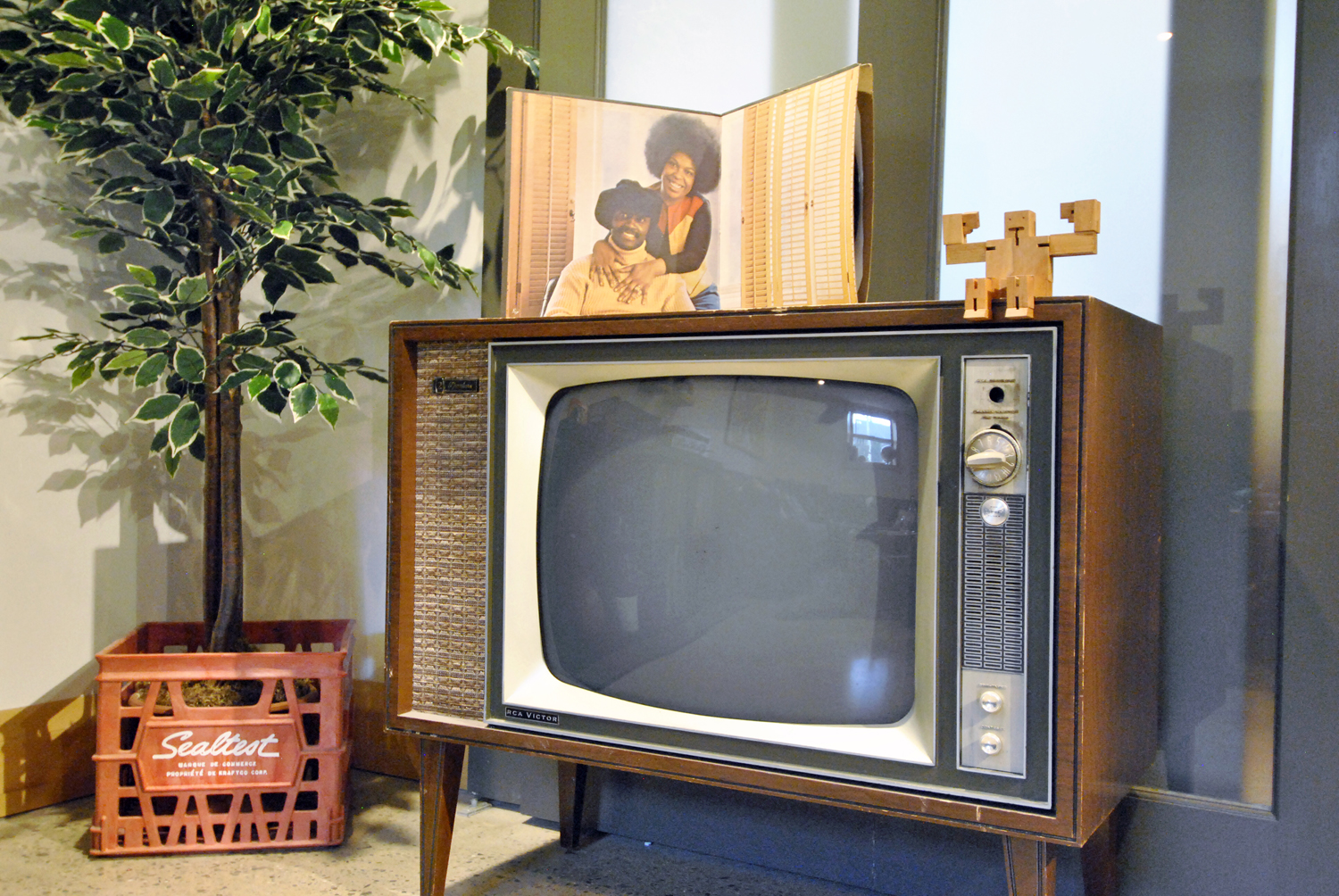 An old-fashioned TV in a basement apartment