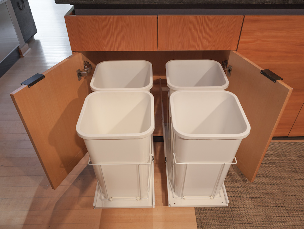 white pull-out containers in kitchen cabinets