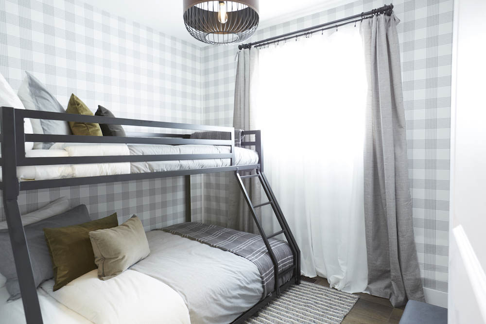 Checkered wallpaper in bedroom with bunk bed