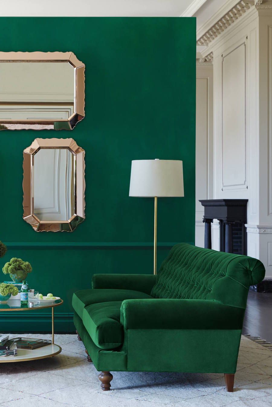 This jewel-tone green living room makes a major style statement.