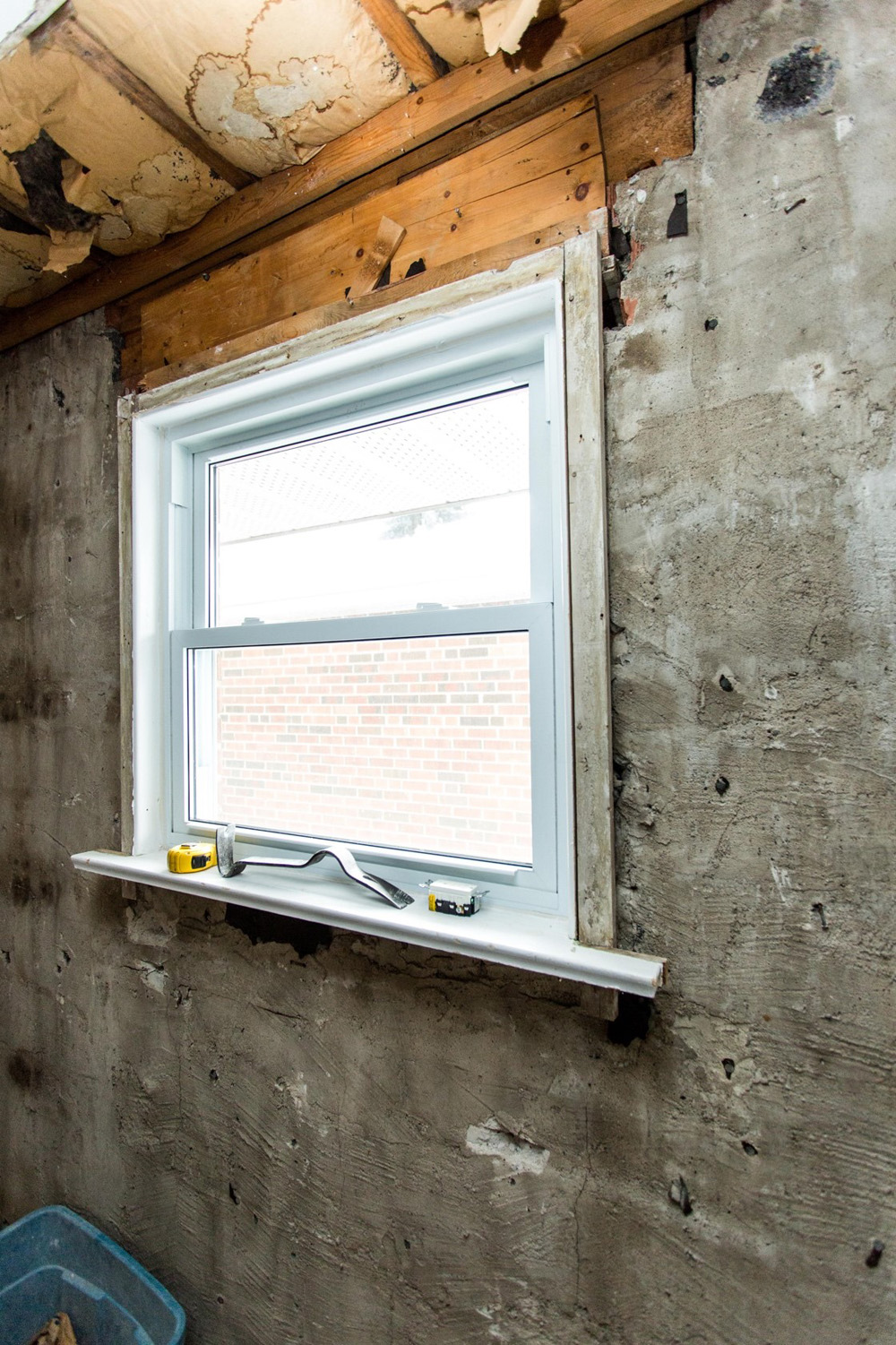 A window in a renovated home with poor ventilation