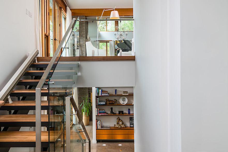 Lower level staircase of mid-century modern Toronto-area lakefront home