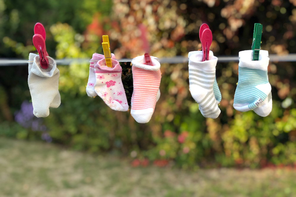 baby socks hanging to dry