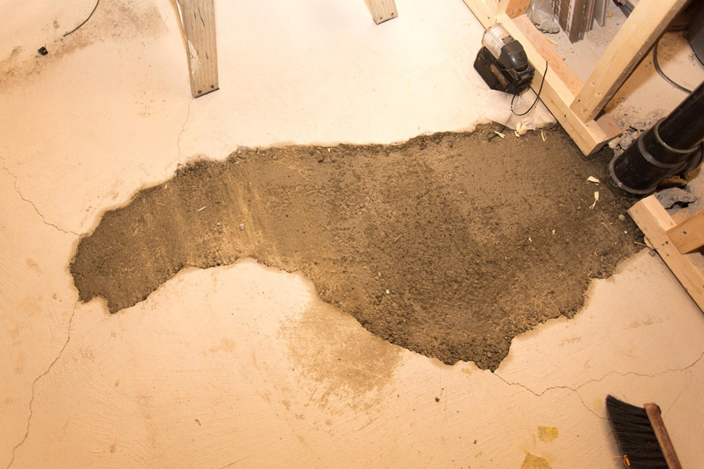Water damage on a basement floor