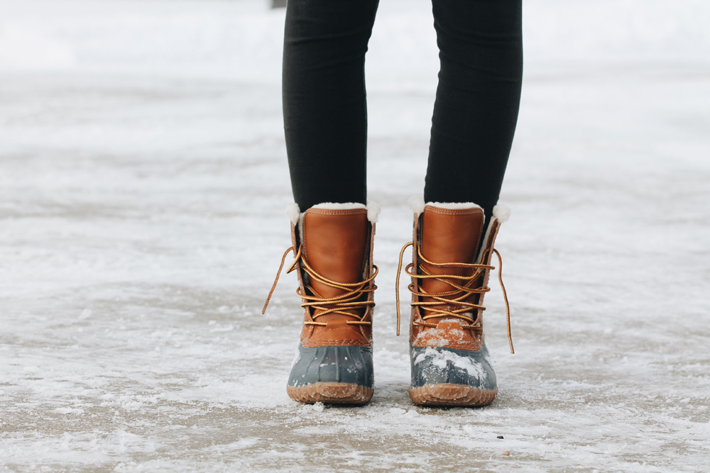 Woman wearing brown winter boots