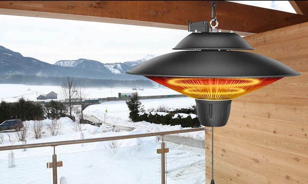 hanging heater on balcony with a snowy background and mountains