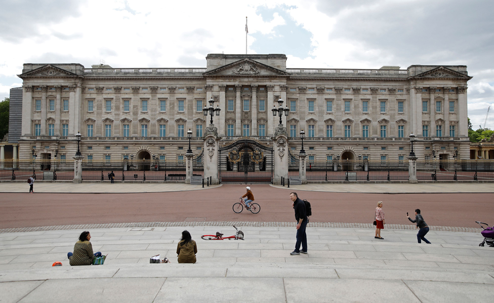 Exterior of Buckingham Palace, a 828,821-square-foot palace with 775 rooms spread out over five floors