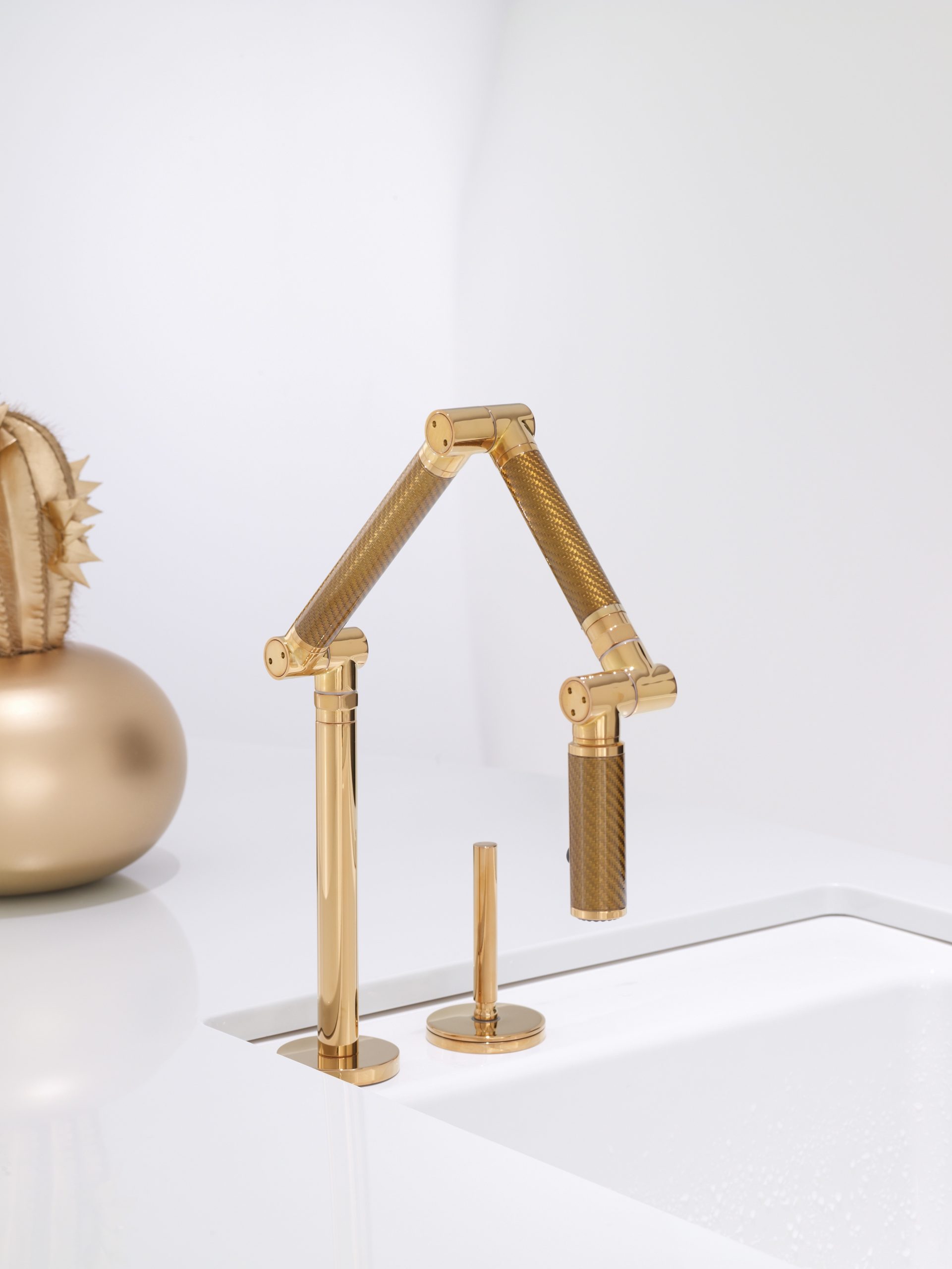 Kohler's Karbon Articulating Faucet in Brass