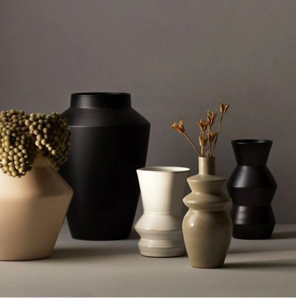 A set of various empty terra cotta vases