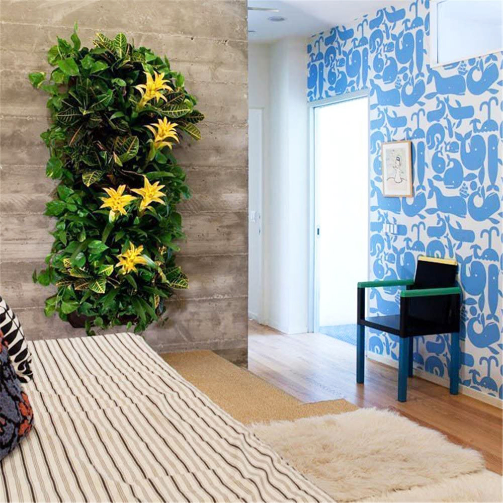 A vertical garden wall in an open-concept condo hallway