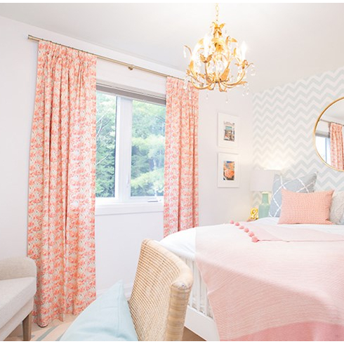 A room with pink curtains