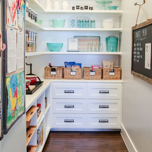 A white painted walk-in pantry