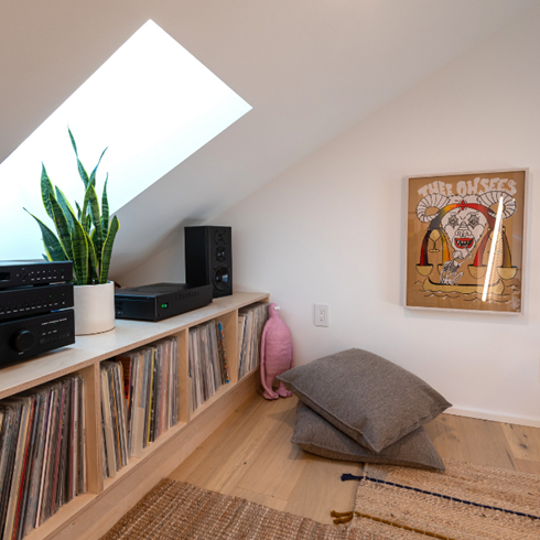 A shot of the loft space with records and a record player