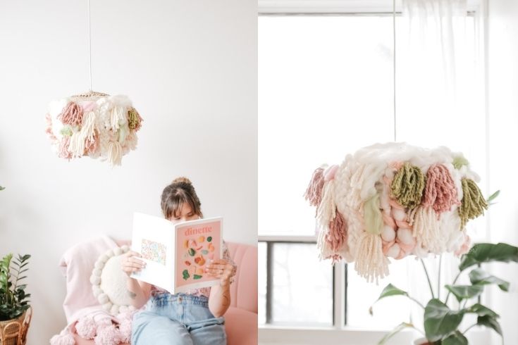 The finished white, cream, pink and green DIY lampshade hangs in front of a window, over a reading nook featuring a pink sofa with a pink throw and a circular cream cushion on it.