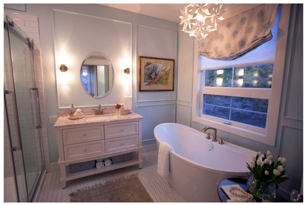 Spa bathroom with soaker tub and elegant vanity