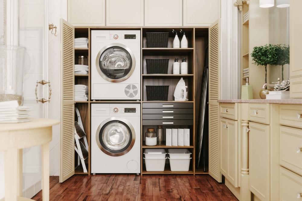 A luxury laundry room with white built-ins
