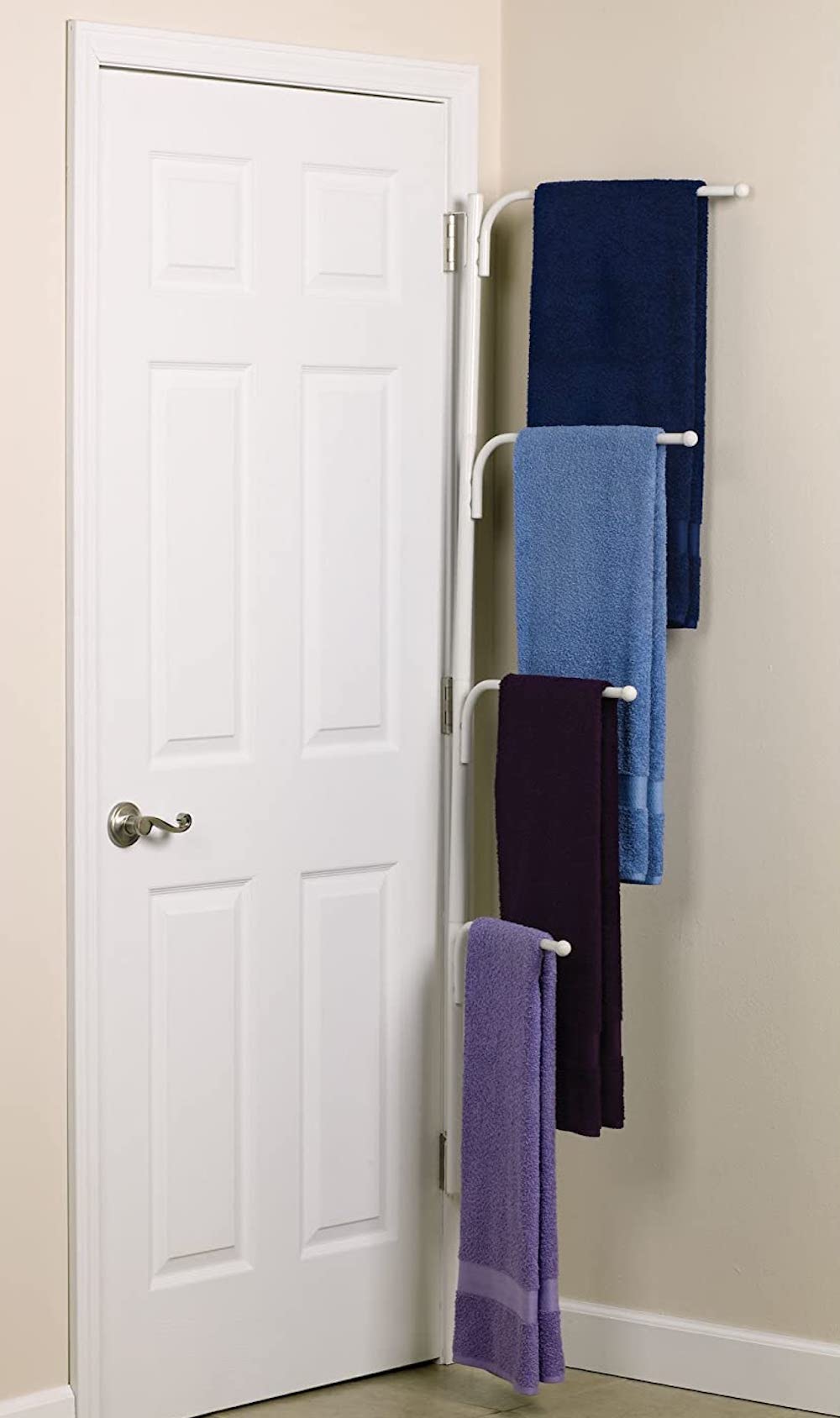 Household Essentials Hinge It Clutter Buster Hanging Valet family towel rack with 4 parallel bars attached to the side of a bathroom door