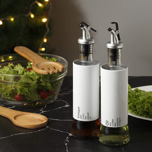 Modern matching white olive oil and vinegar dispensers