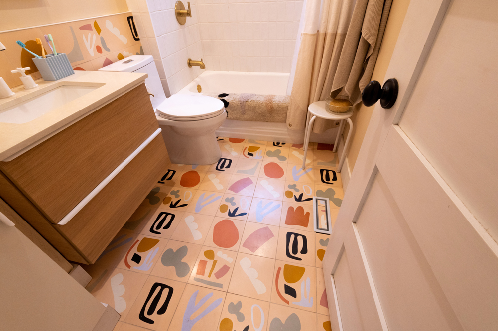 Bathroom with fun tiled floor in Amy Highton's Calgary house
