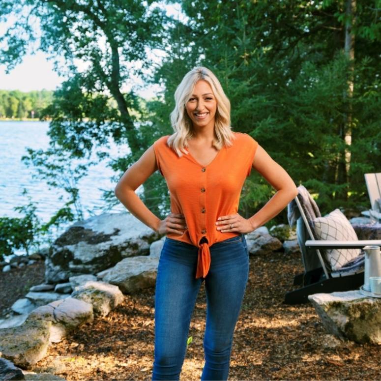 Debra Salmoni smiling in front of a lake