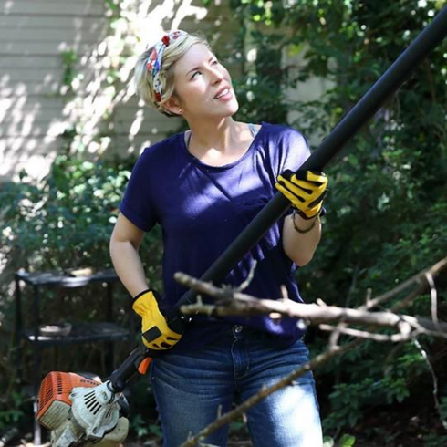 Erin Napier renovating outdoors on Home Town