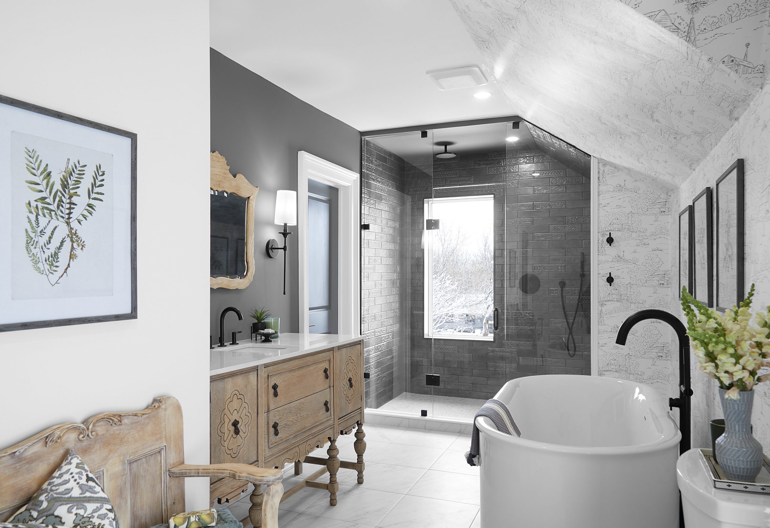 A modern farmhouse bathroom with repurposed antique vanity